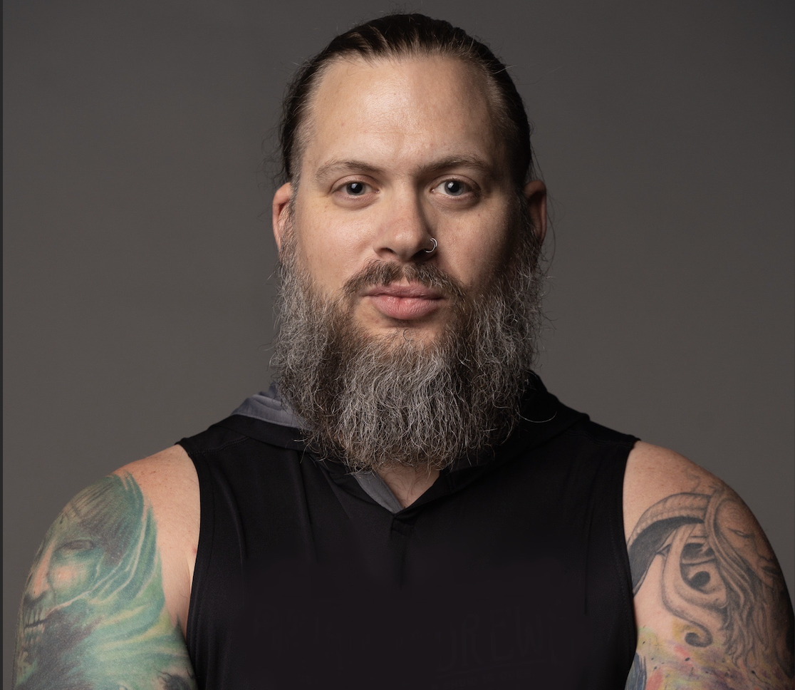 First Vice Chairman Brian Hill is pictured wearing a black shirt and sporting a long beard.